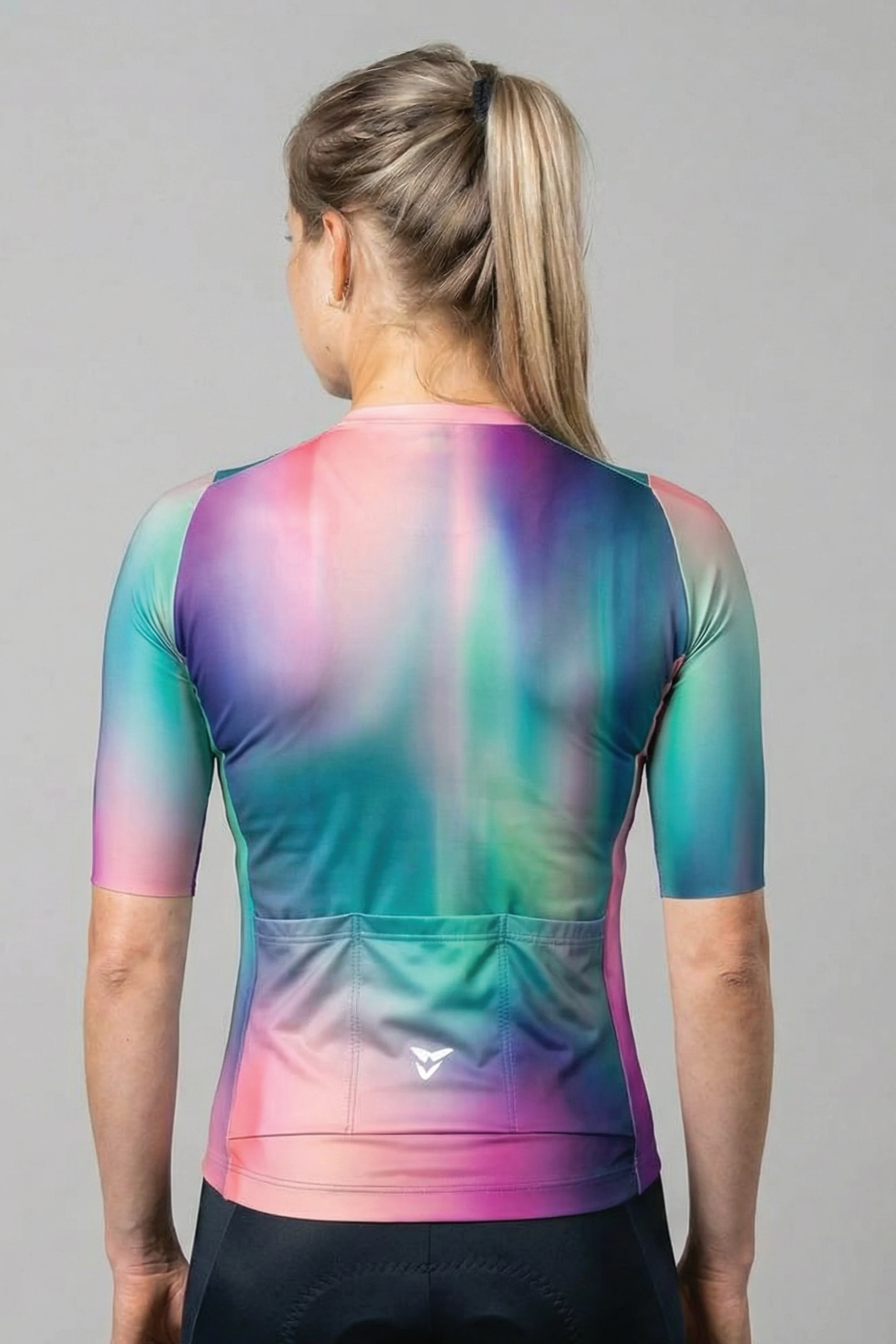 women-s-bronze-comp-jersey-galaxy-back.webp